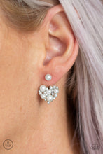 Load image into Gallery viewer, A solitaire white pearl attaches to a double-sided post, designed to fasten behind the ear. Radiating with dainty white rhinestones and matching pearls, the heart-shaped double sided-post peeks out beneath the ear for a refined look. Earring attaches to a standard post fitting.  Sold as one pair of double-sided post earrings.
